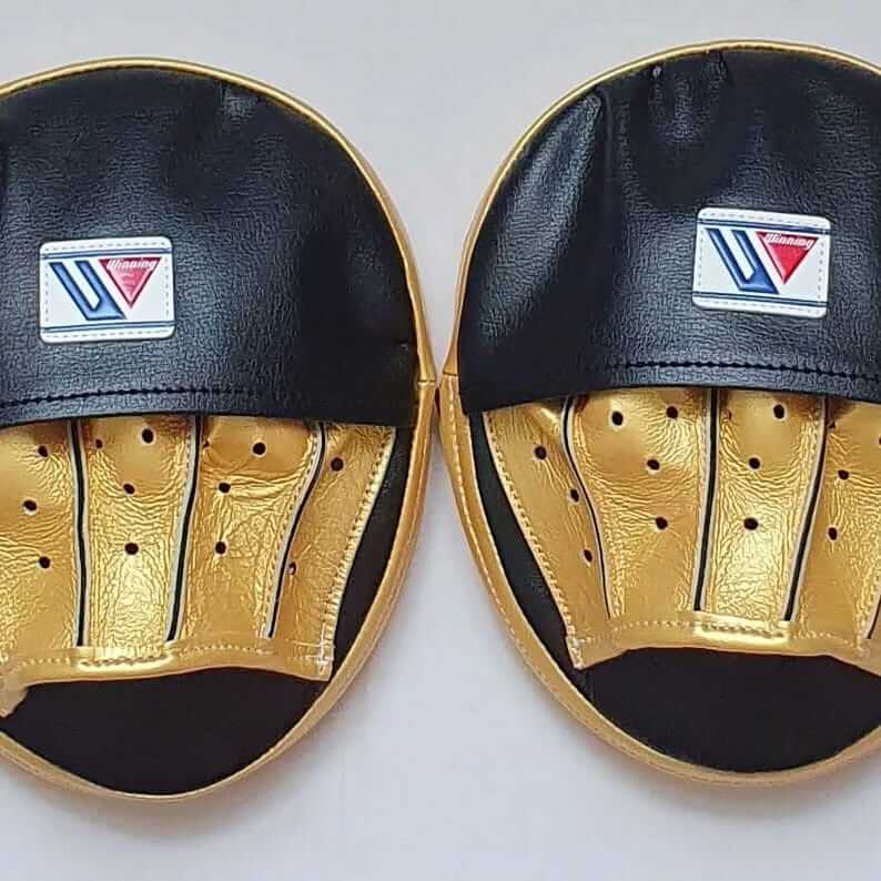 Winning Style Oval Focus Mitts – Custom Black & Gold Boxing Coach Pads