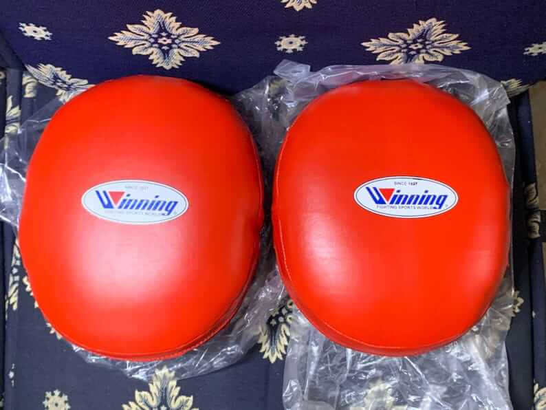 Winning Style Oval Focus Mitts – Custom Red Leather Boxing Coach Pads
