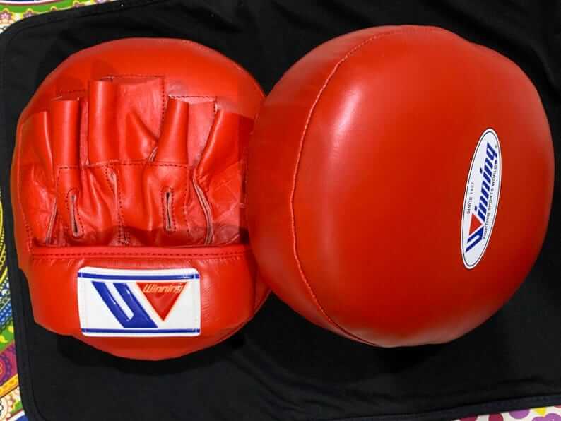 Winning Style Oval Focus Mitts – Custom Red Leather Boxing Coach Pads